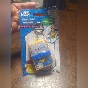 Hasbro Trivial Pursuit Keychain Game - Blue and Yellow